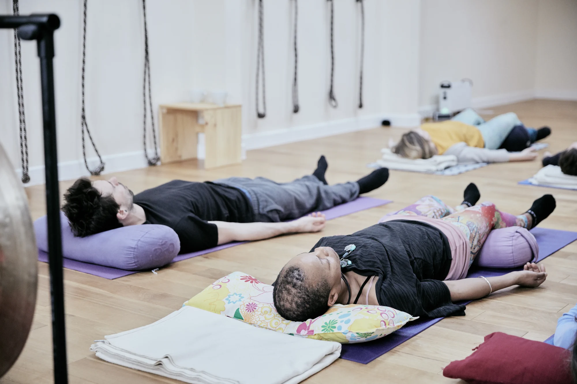 A public yoga class in a studio